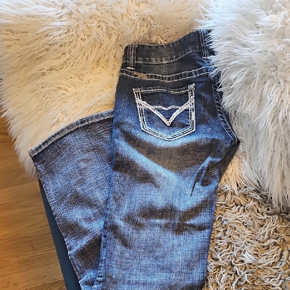 Blue Boot Cut Jeans with Classic Denim Texture and Faded Wash